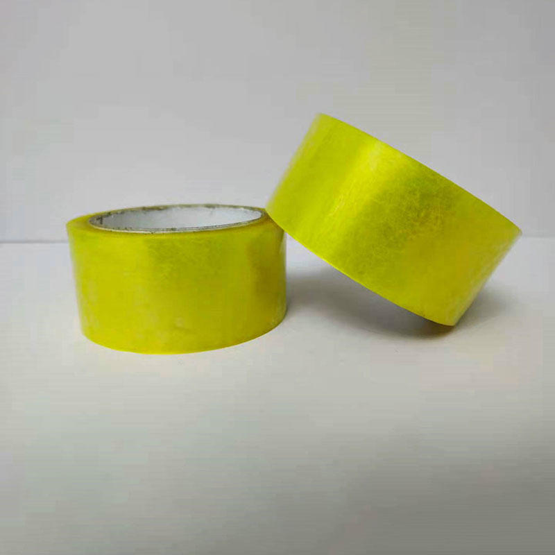 Cinta de embalaje de BOPP adhesiva amarillenta pegajosa transparente de alta calidad de alta viscosidad de China para el sellado de cajas de cartón